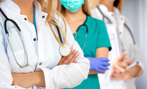 A stock image showing various medical professionals in medical attire.